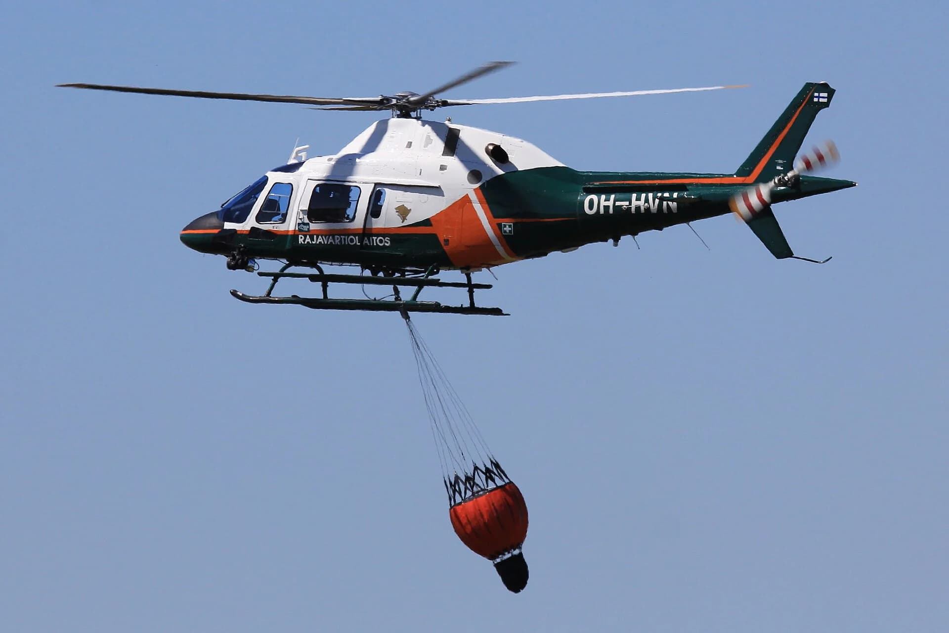 An AW119 Koala in flight during an aerial work demonstration