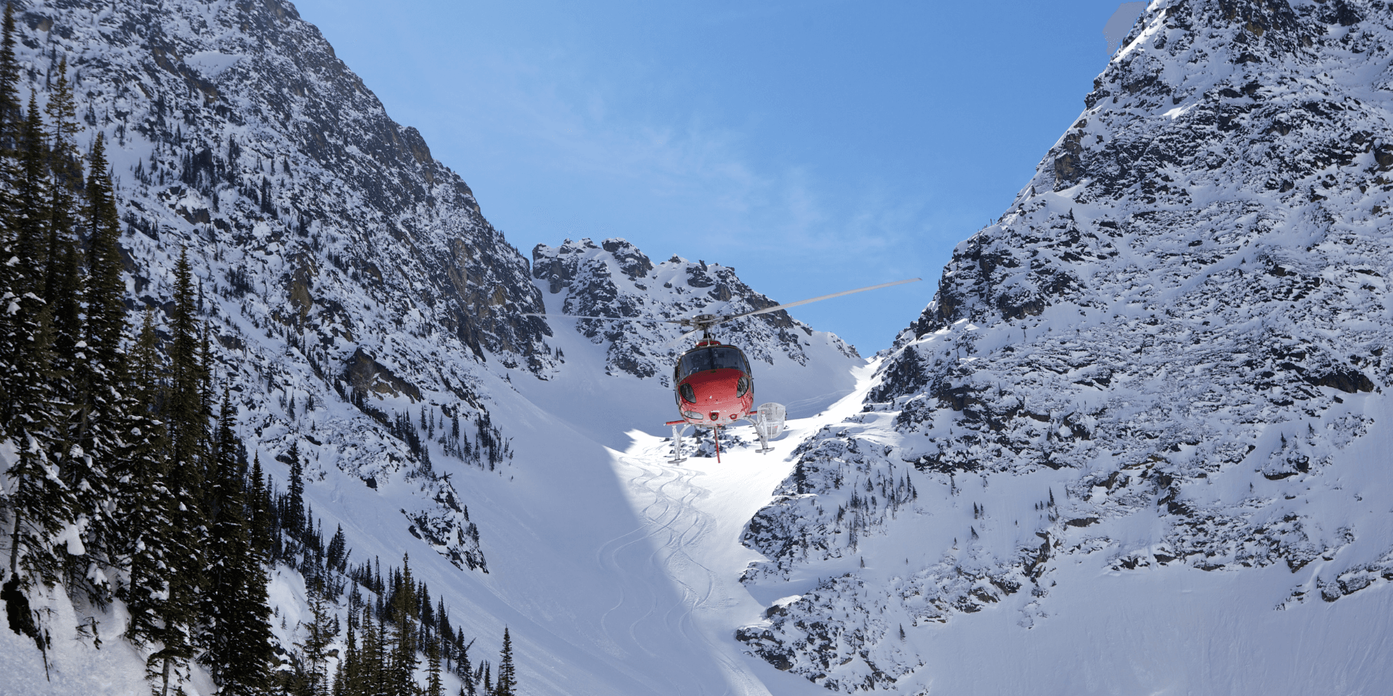 Helicopter is flying over mountains