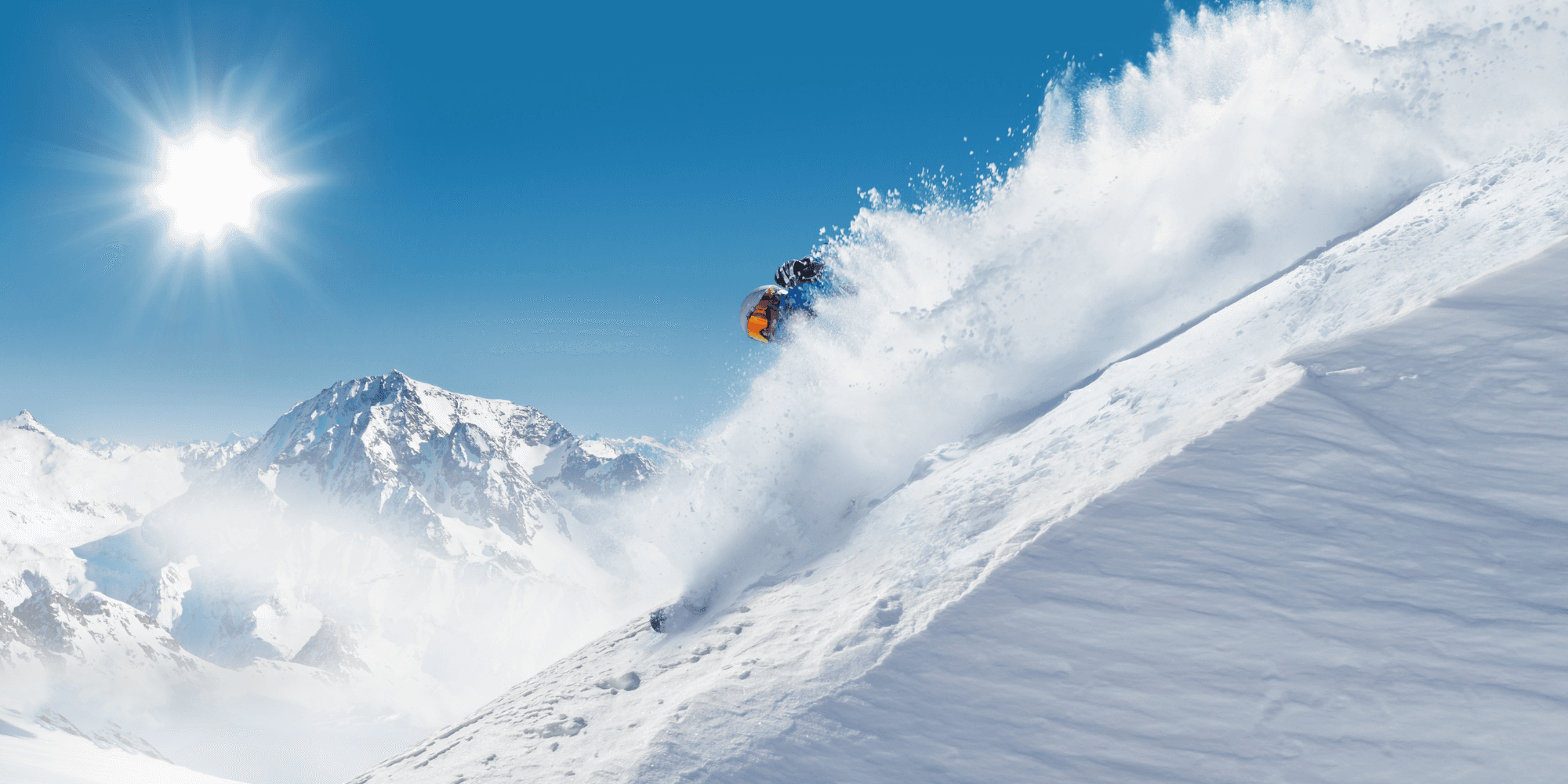 A skier skiing in the mountains